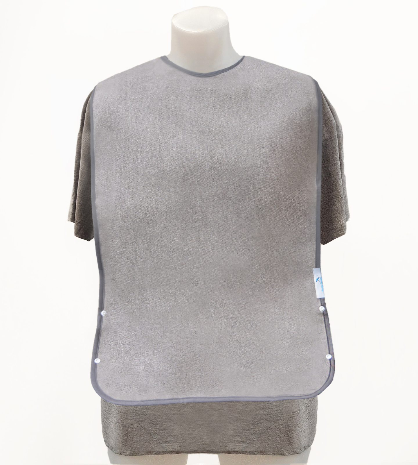 Grey adult tray bib with tray down. 